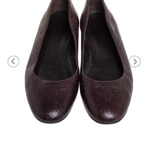 Gucci Women's Dark Brown Embossed Flats